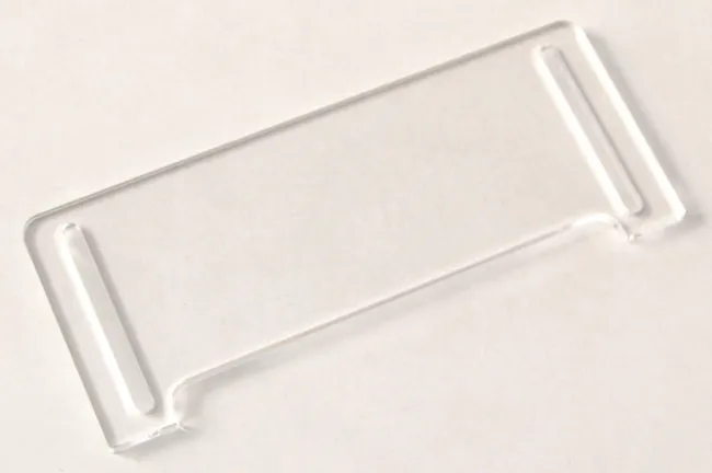 Laser-cut clear acrylic piece created with Trotec CO₂ laser cutter
