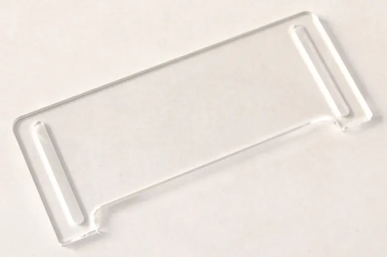 Laser-cut clear acrylic piece created with Trotec CO₂ laser cutter