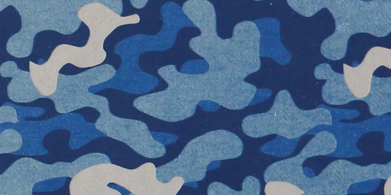 Blue camouflage pattern engraved on material using Trotec CO₂ laser cutter