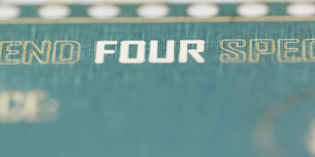 Close-up of laser engraved text on acrylic using Trotec CO₂ laser cutter