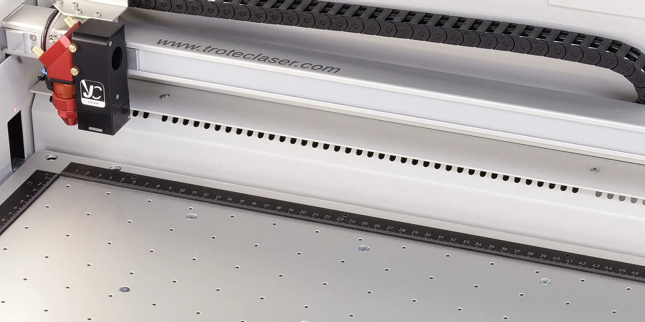 Close-up of Trotec Speedy series CO₂ laser engraver with JC Vision camera system