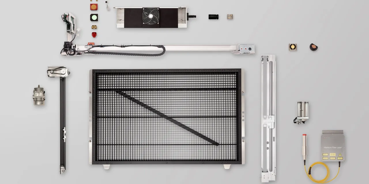 Disassembled components of Trotec SpeedMarker laser marking machine with fiber laser module