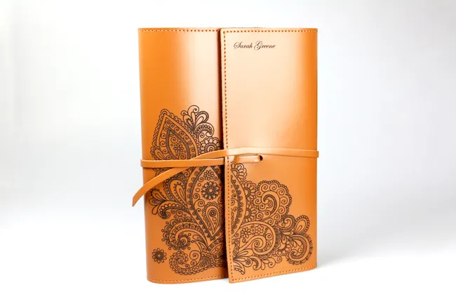 Custom leather notebook with paisley design and name engraved using Trotec CO₂ laser