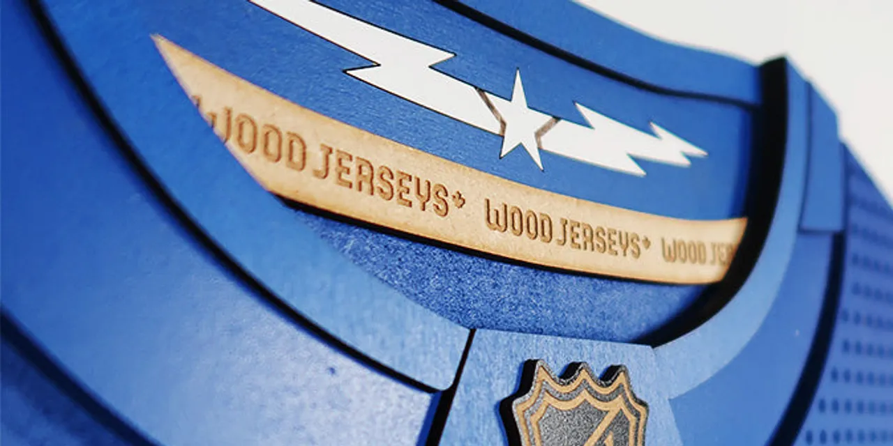 Laser-engraved NHL wood jersey detail created with Trotec Speedy series laser cutter