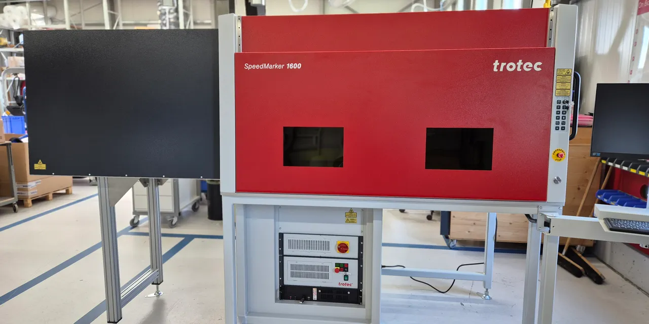 Trotec SpeedMarker 1600 laser marking system in industrial workshop setting