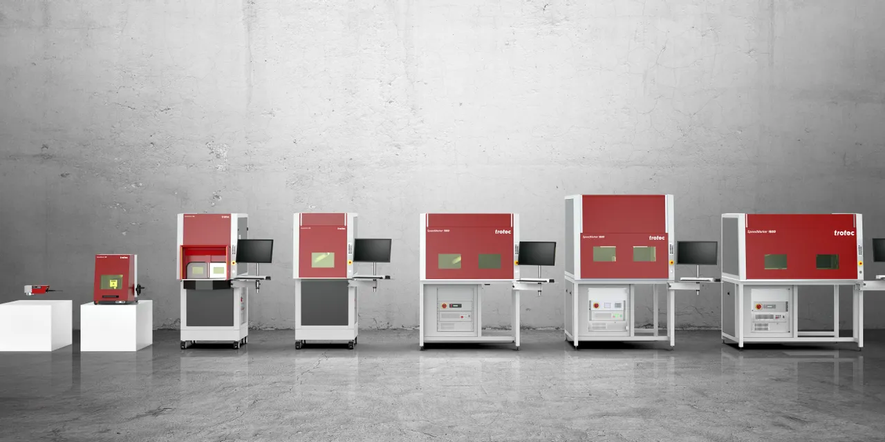 Trotec SpeedMarker laser marking machines lineup with red enclosures and integrated monitor setups